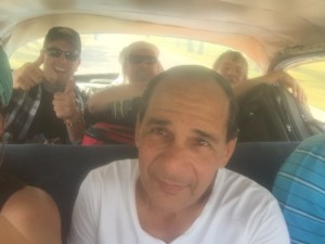 A crowded taxi ride makes for a true Cuban experience